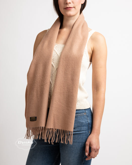 Model wearing a plain beige wool scarf - 100% pure wool - dreamylondon